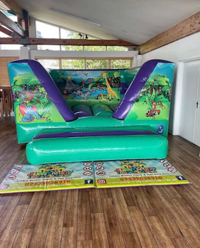 Low Height Jungle Theme Bouncer, a bouncy castle for hire from Jump N Joy Inflatables