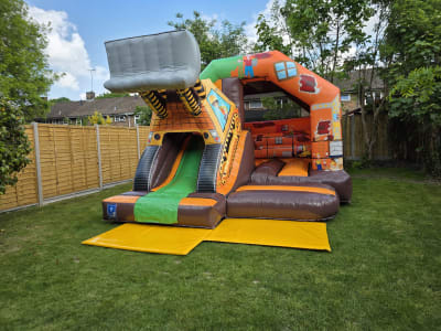15ft x 12ft Digger 3D Bouncy Castle with Slide, a bounce and slide combo for hire from MLM Bouncy Castles