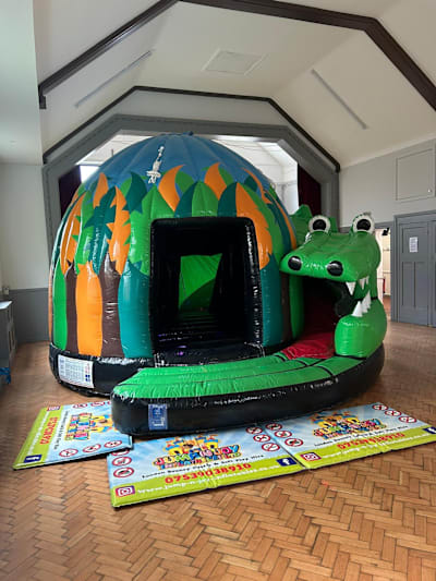 Croc Disco Dome With Slide, a disco dome for hire from Jump N Joy Inflatables