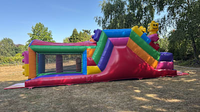 27ft Lego Obstacle Course, a assault course for hire from Bouncing Happy