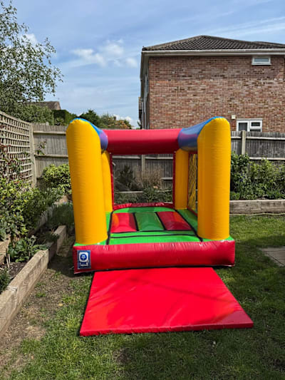 7ft x 7ft Multicoloured Mini Bouncer, a toddler inflatable for hire from Bouncing Happy