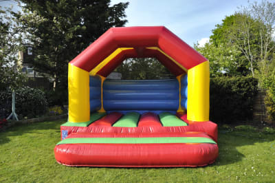 Multicoloured Bouncy Castle 12ft x 12ft A Frame, a bouncy castle for hire from Bouncy Boss