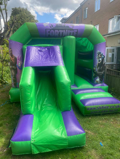 12' x 18 ft' FORTNITE, Jump and Slide Castle, a bounce and slide combo for hire from SK Hire Events