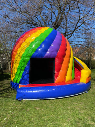 Candy Twist N Slide Castle, a bounce and slide combo for hire from Let's Make Memories