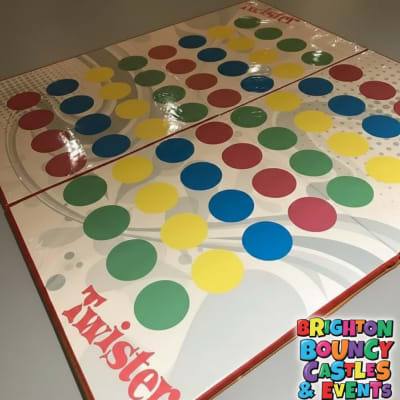 Giant twister matt and dice 10x10ft, a inflatable game for hire from Brighton Bouncy Castles