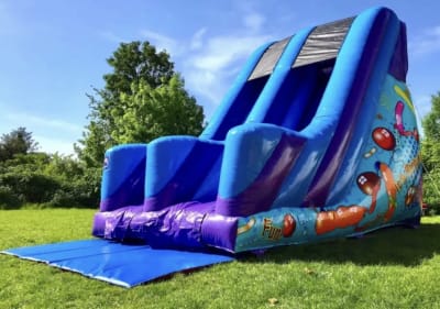 10ft Party Time Slide, a inflatable slide for hire from Wazoggies Bounce House
