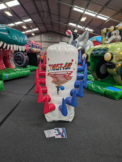 Twist Air 2 player game, a inflatable game for hire from Elmbridge Inflatables