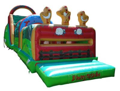 14 x 56ft Farmyard Obstacle Course, a assault course for hire from JV Bouncy Castle Hire