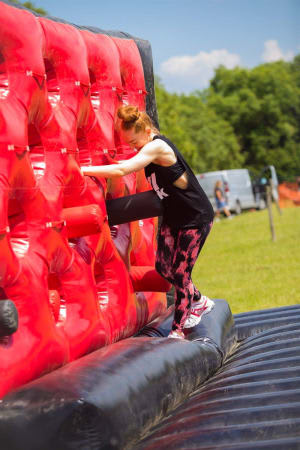 Sucker Punch Wall Obstacle, a assault course for hire from 1st Choice Inflatables