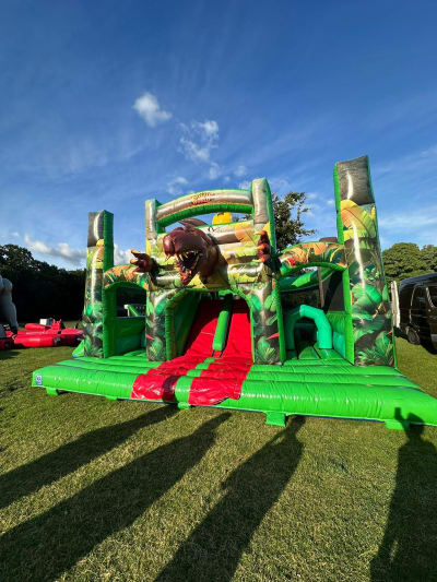 Dinosaur Activity slide, a inflatable slide for hire from Funday Entertainment