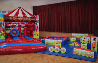 12x12 Circus H Frame Biff & Bash Castle & Soft Play Hire, a bouncy castle for hire from Alpha Inflatables and Events