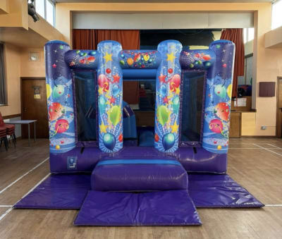 Blue & Purple Party Midi Castle INDOORS ONLY 10ftx13ft, a bouncy castle for hire from Elmbridge Inflatables