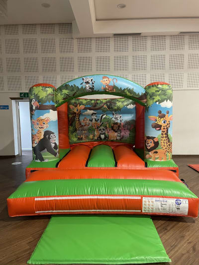 Low Height Jungle Fever Castle, a bouncy castle for hire from Bouncy Mania