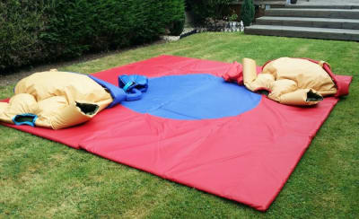 Adult Sumo Wrestling Suits, a inflatable game for hire from Wizard Bouncy Castles