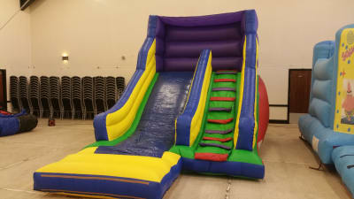 Colourful Slide, a inflatable slide for hire from Laxcorp Event Hire