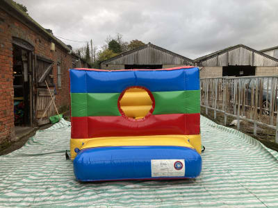 Rainbow Box Toddlers Bouncy Castle, a bouncy castle for hire from Wallington Bouncy Castles
