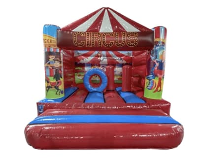 12x12 Circus Biff & Bash H Frame Bouncy Castle Hire Surrey & West Sussex, a bouncy castle for hire from Alpha Inflatables and Events