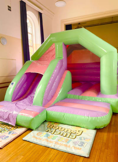 Dreamy Pastel Bounce N Slide, a bounce and slide combo for hire from Bouncy Mania