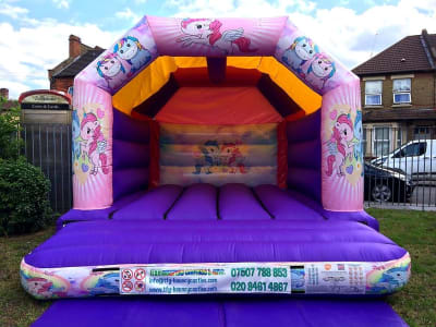 15 x 12 Unicorn bouncy castle ( LARGE ), a bouncy castle for hire from TFG Bouncy Castles