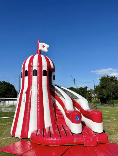 Helter Skelter Slide, a inflatable slide for hire from Wazoggies Bounce House