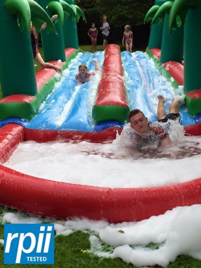 Water Slide Dual Lane Inflatable 40ft x 12ft, a inflatable slide for hire from 1st Choice Inflatables