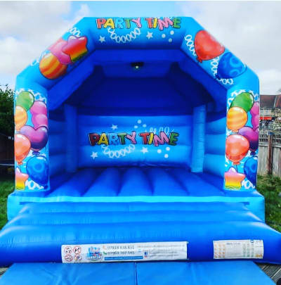 15ft by 17ft Party Time Theme Castle, a bouncy castle for hire from Jump Around Bouncy Castles