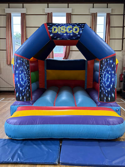 Disco Theme (Multicoloured Castle Only), a bouncy castle for hire from Bounce N Fun