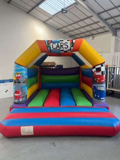 Cars Bouncy Castle (15ft x 12ft), a bouncy castle for hire from The Bounce Generation