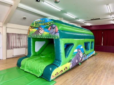 25ft Jungle Fun Run, a assault course for hire from Jumping Jacks Bouncy Castles