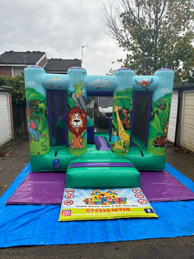 Jungle Midi Bouncer, a bouncy castle for hire from Jump N Joy Inflatables