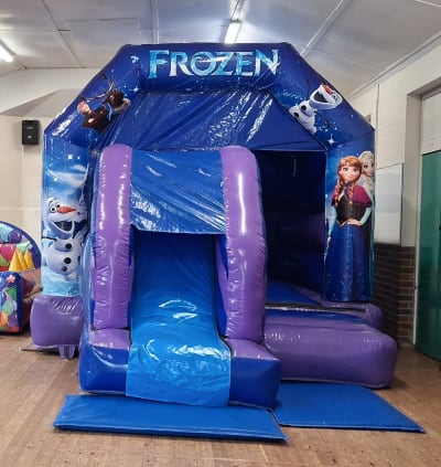 12ft x 18 ft Frozen Character Slide Castle, a bounce and slide combo for hire from Bouncy Castle Boys