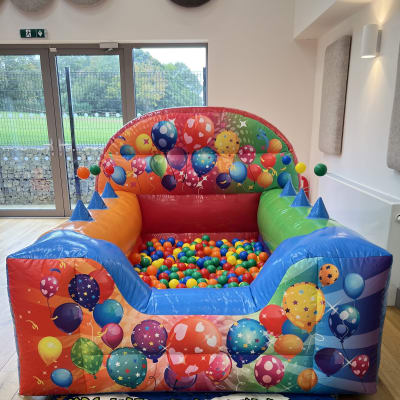 Multi Coloured Party Air Juggler Ball Pit, a soft play set for hire from Bounce Again