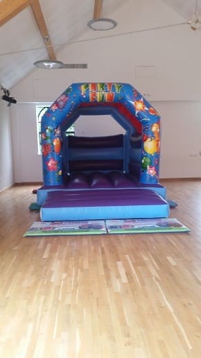 12x14ft Party Fun Blue Bouncy Castle., a bouncy castle for hire from Betchley's Bouncy Castles
