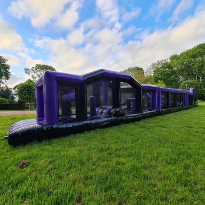 90ft Purple and Black Obstacle Course, a assault course for hire from Crockerz Castles