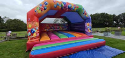 20 x 20 adults party castle, a bouncy castle for hire from Bounce About Sussex