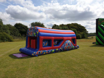Partytime Obstacle Course, a assault course for hire from Allsorts Inflatables