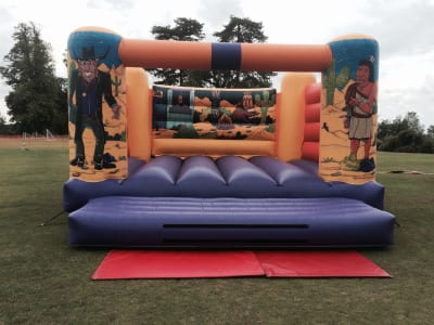 Wild Western Adult Bouncy Castle, a adult bouncy castle for hire from Animal Bouncers