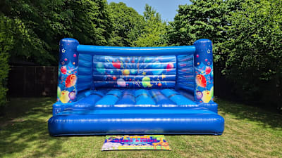 Adult Bouncy Castle Party themed 18ft x 18ft, a adult bouncy castle for hire from 1st Choice Inflatables