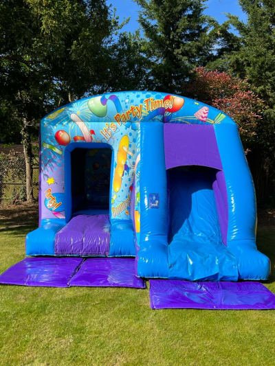 Party Bounce 'n' Slide (12ft x 18ft), a bounce and slide combo for hire from Elmbridge Inflatables