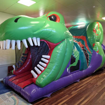 Dinosaur fun run, a assault course for hire from Bounce About Sussex