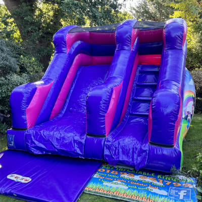 Unicorn themed 5ft Platform Slide, a inflatable slide for hire from KBS Inflatable Kingdom