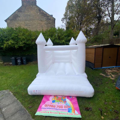 Premium White Wedding Castle, a bouncy castle for hire from Bouncy Castle Fun World