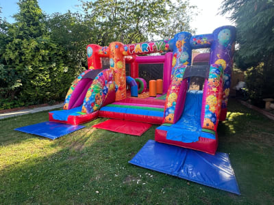*NEW* Activity Double Slide Multi Colour Party, a inflatable slide for hire from BJ's Bouncy Castles & Soft Play Hire