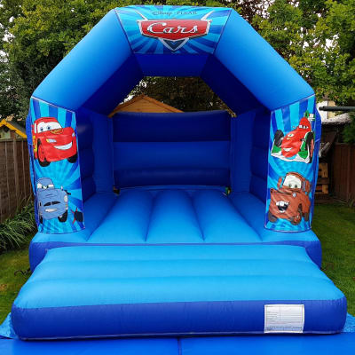 CARS BOUNCY CASTLE 15FT vs 11ft, a bouncy castle for hire from All Bounce Surrey