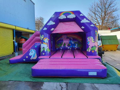 Unicorn Bounce & Slide Combo Bouncy Castle, a bounce and slide combo for hire from Cookes Castles