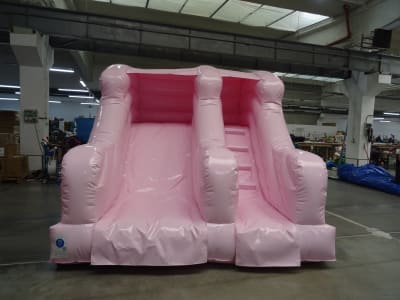 Pastel Pink Mini Slide, a inflatable slide for hire from Playdays Parties