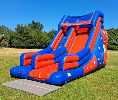 Red Blue Superslide, a bouncy castle for hire from Laxcorp Event Hire