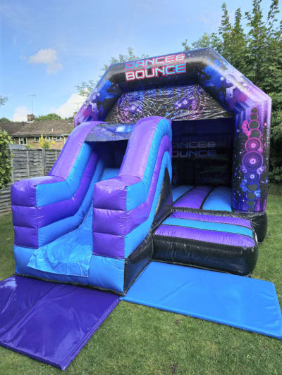 12ft x 18ft Disco Bouncy Castle With Slide + Bluetooth Speaker + Party Lights, a bounce and slide combo for hire from MLM Bouncy Castles