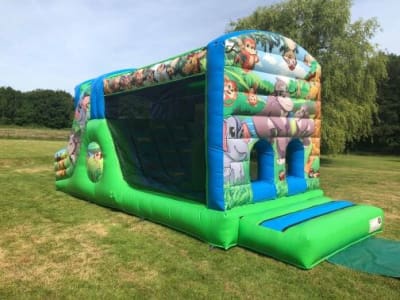 28ft JUNGLE THEMED FUN RUN AND SLIDE, a assault course for hire from Rick's Castles