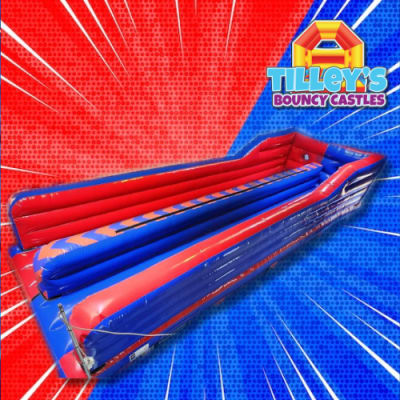 Bungee Run, a assault course for hire from Tilley's Bouncy Castles and Soft Play Hire
